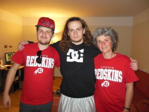 Dan and his host brother, Julian, and host mother sporting GHS shirts